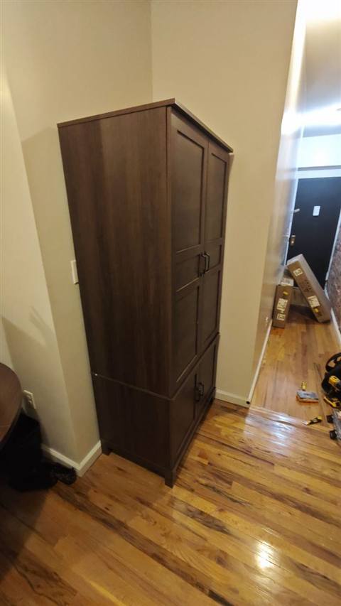 Tall walnut wardrobe